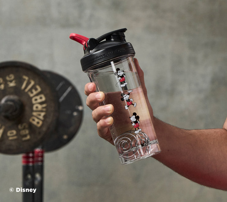 pro-series-r2 Mickey_Mouse_Protein_Shaker_Bottle_Being_Held_In_the_Gym.jpg